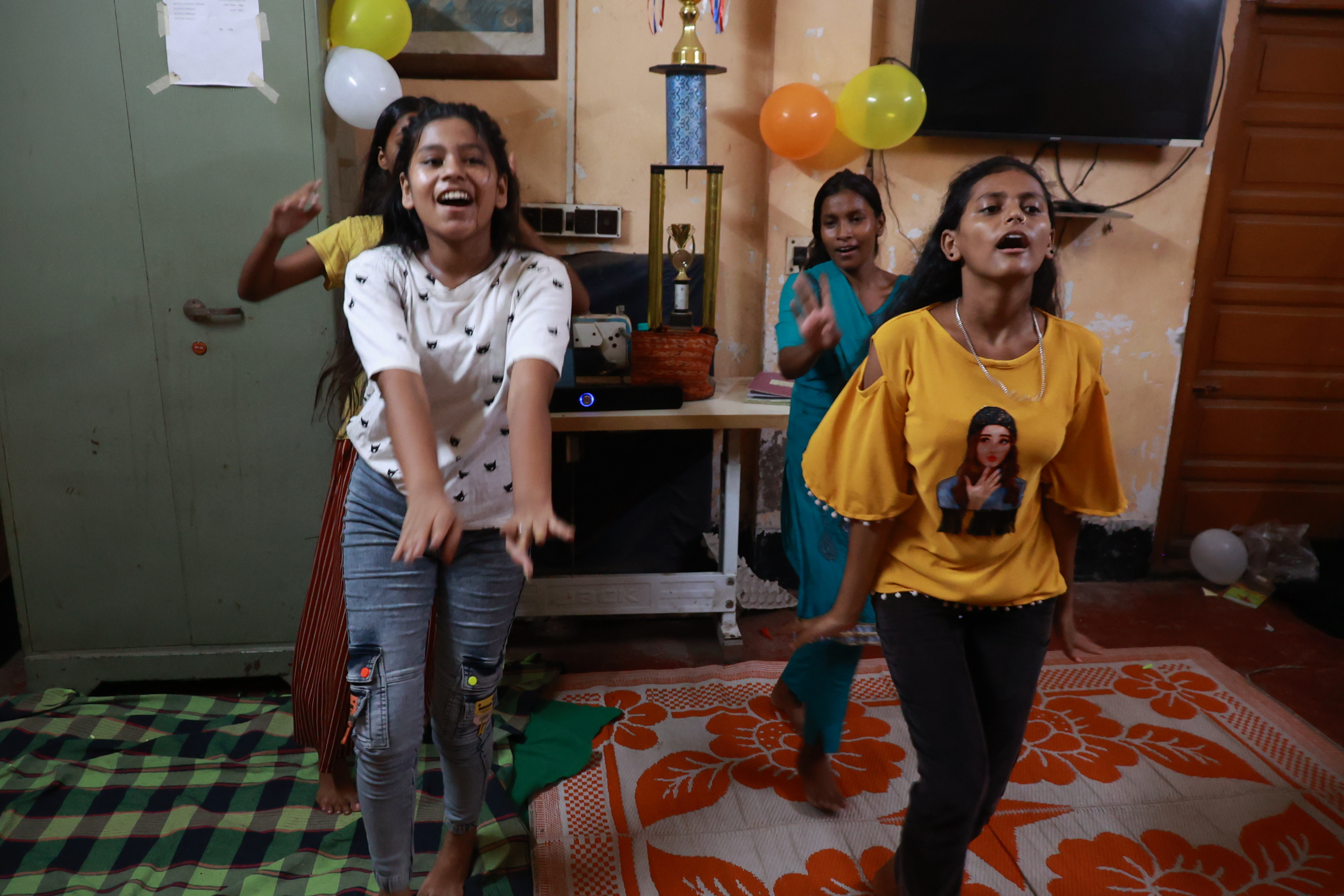 Young girls learning in a classroom setting